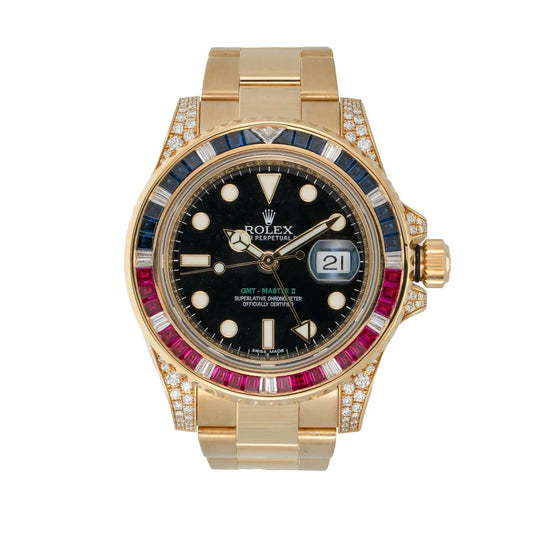 Rolex 116758 YG GMT watch with yellow gold bracelet, black dial, sapphire and ruby bezel, and diamond accents.