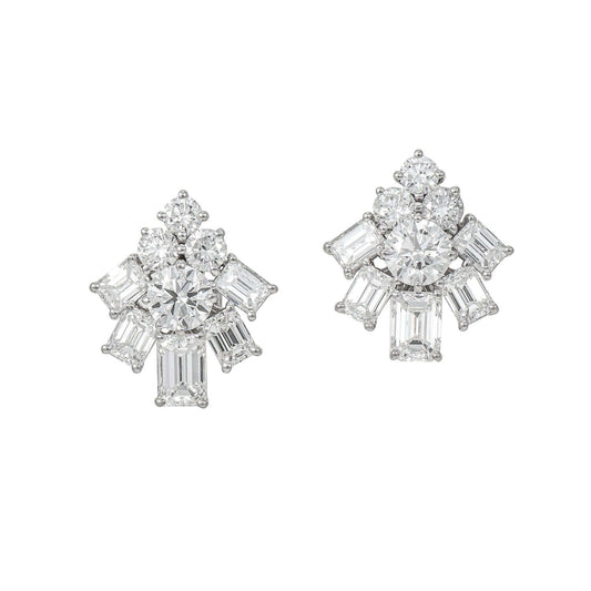 Graff white gold and platinum earrings with 4.64ct emerald cut and round diamonds showcasing luxurious and timeless design.